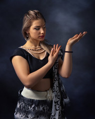 Dancing  woman in the national Indian costume