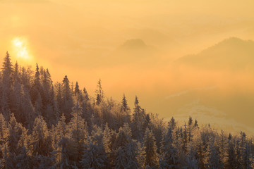 Mountain valley panorama during sunrise. Beautiful natural panoramic landscape in winter time.