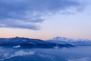 Naklejka na ściany i meble Clouds approaching to ridge of Tatra mountains.