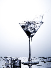 Water splash in martini glass