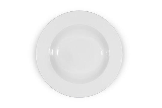 Soup deep white round plate with wide shoulders on white background directly from above