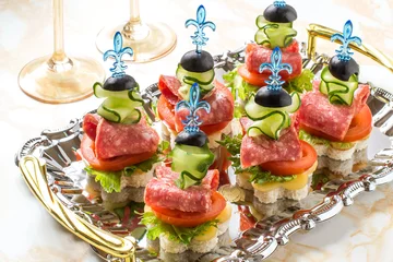 Poster Canape on skewers with vegetables and sausage © 13smile