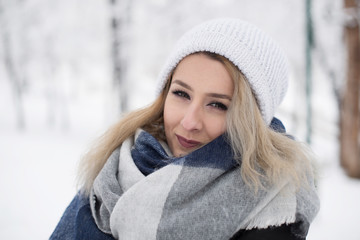 portrait of young woman in winter clothes 