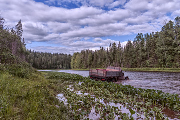 the car goes through the river