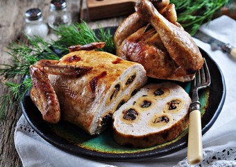 Baked chicken stuffed pancakes with mushrooms.