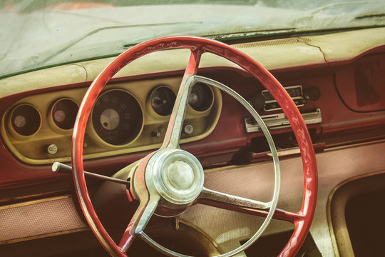 Weathered dusty interior of a classic car