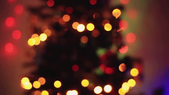 Defocused christmas tree lights with Colorful bokeh. Beautiful abstract background. 1920x1080