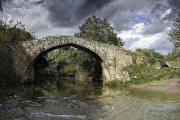 Fototapeta na wymiar Old stone bridge in Peloponnese, Greece
