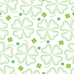 Vector seamless pattern with dotted lucky four leaf clover or shamrock in green on the white background. Holiday background with traditional symbol for St. Patrick day in dotwork style.
