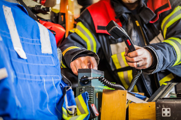 HDR - Feuerwehrmann im Einsatz mit Funkgerät - 133545650
