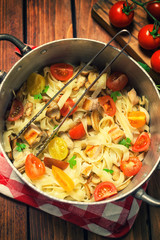 Homemade pasta with mushroom,chicken meat and vegetables