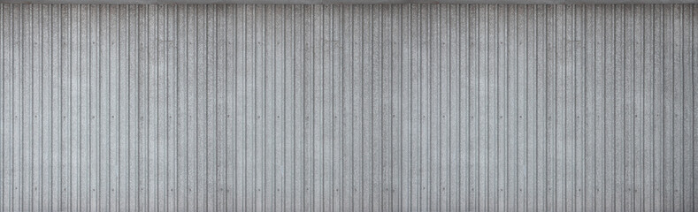Metal panels texture closeup in the daytime outdoors. Metal wall or fence embossed metal sheets. Terrain and large metal sheet as a barrier or fence - Powered by Adobe