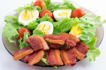 Fresh lettuce, cherry tomatoes, bacon and boiled eggs
