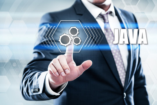 Business, technology, internet concept on hexagons and transparent honeycomb background. Businessman  pressing button on touch screen interface and select  java