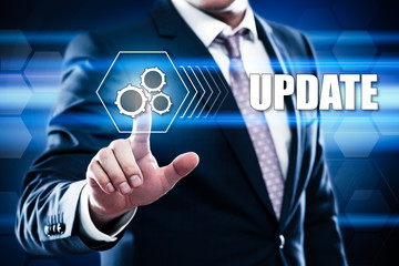 Business, technology, internet concept on hexagons and transparent honeycomb background. Businessman  pressing button on touch screen interface and select  update