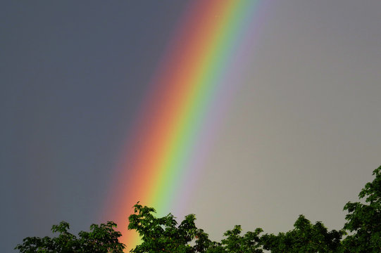 A bright colorful rainbow pillar in Quebec, Canada.