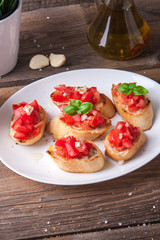 Bruschetta with tomato, onion and basil