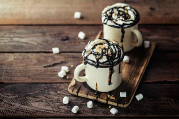 Photo sur Plexiglas Chocolat hot chocolate or irish coffee or cocoa drink with whipped cream