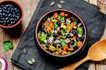 Roasted sweet potato black bean pepita avocado salad