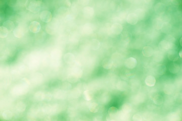 Blurred green background with bokeh lights