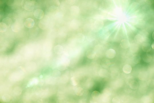 Blurred green background with bokeh lights