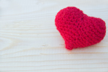 Heart on wood background