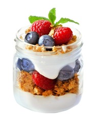 Healthy blueberry and raspberry parfait in a mason jar isolated on a white background