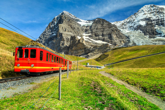Electric tourist train and Eiger North face, Bernese Oberland, Switzerland