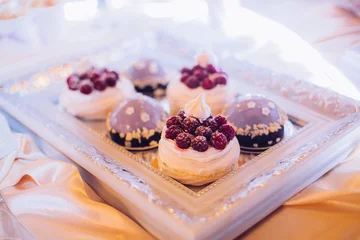 Gordijnen Beautifully decorated party setting with gourmet desserts catering, © nataliakabliuk