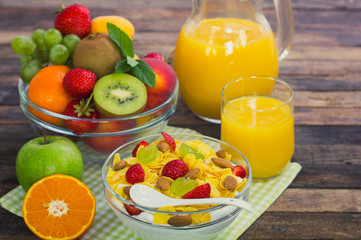 Healthy breakfast - muesli, yogurt, honey and fruits
