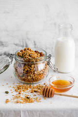 Homemade granola, muesli with yogurt in glasses