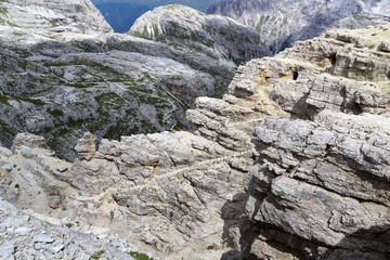 Steps at via ferrata Alpinisteig and Sexten Dolomites mountain panorama in South Tyrol, Italy