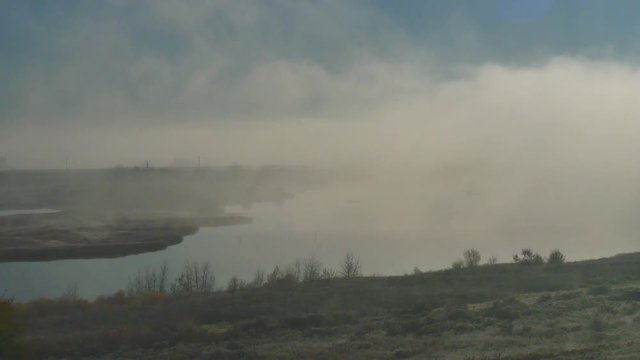 Fog on the Bog Drifts Near Highway Traffic