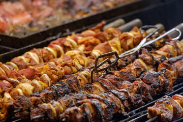Meat dishes are prepared on open fire at the Christmas Fair