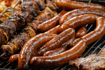 Meat dishes are prepared on open fire at the Christmas Fair