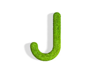 Grass letter J in uppercase format from top angle with shadow on ground.