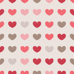 Seamless pattern with colorful hearts on beige background.