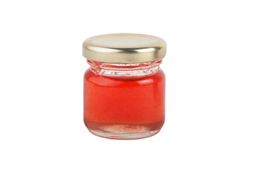 a jar of red jam isolated on white background