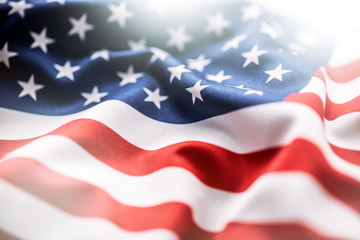 Naklejka premium USA flag. American flag. American flag blowing wind. Close-up. Studio shot.