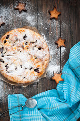 Cherry pie and cookie on rustic wooden background