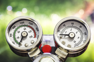 manometer on green background