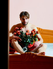 bearded macho man with roses
