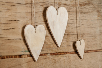 Wood hearts on wood background