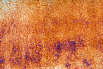 A background of peeling paint and rusty old metal