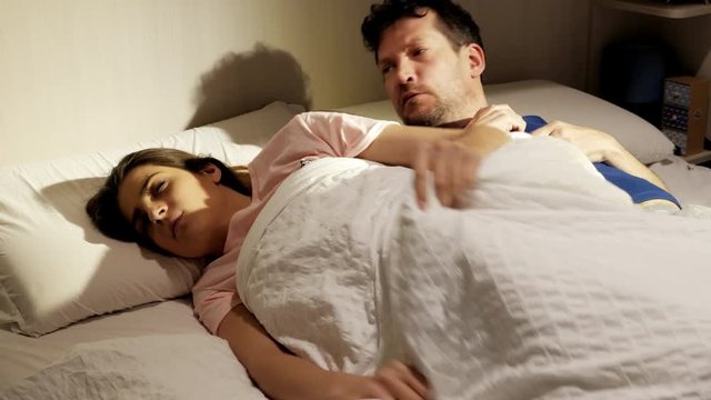 Funny Man Trying To Steal Blanket Of Wife