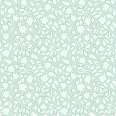 Seamless green background with light tulips pattern.