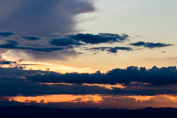 colorful dramatic sky with cloud at sunset