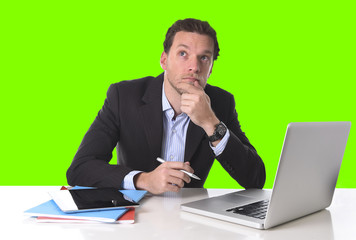 businessman working in stress at office desk computer isolated green chroma key