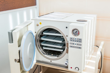 Modern laboratory autoclave sterilizer on the table