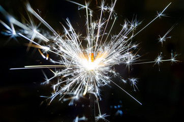 Bengal fires, beautiful sparks on a black background